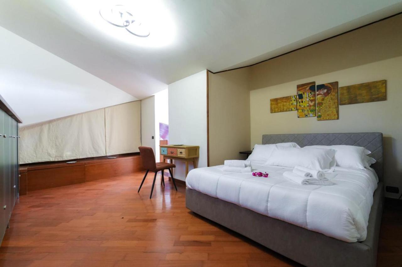 Paradise Suite Latina Exterior foto